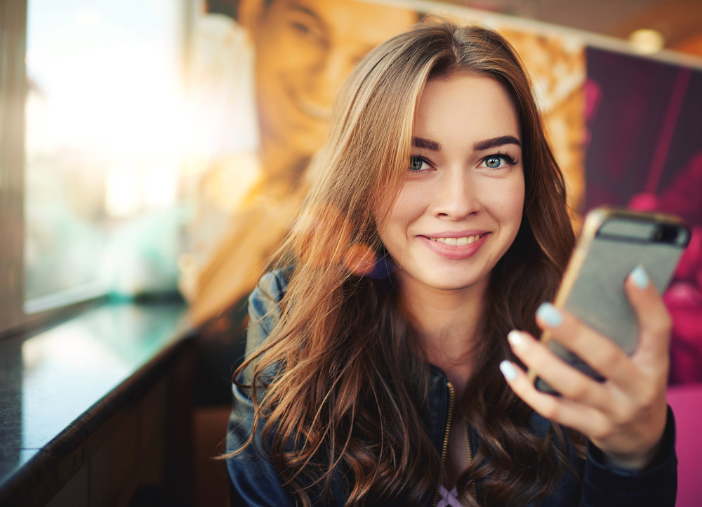 Young girl with phone
