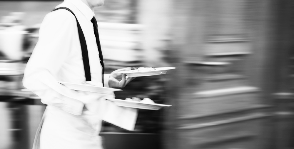 Waiter running with plates resembling the process behind APIs