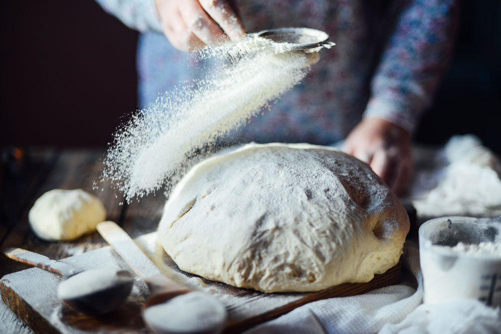 Baker kneading dough