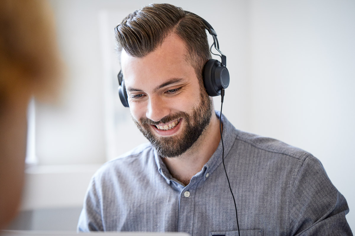 Smiling man with headphones