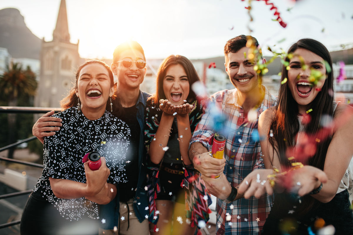 Friends laughing and celebrating