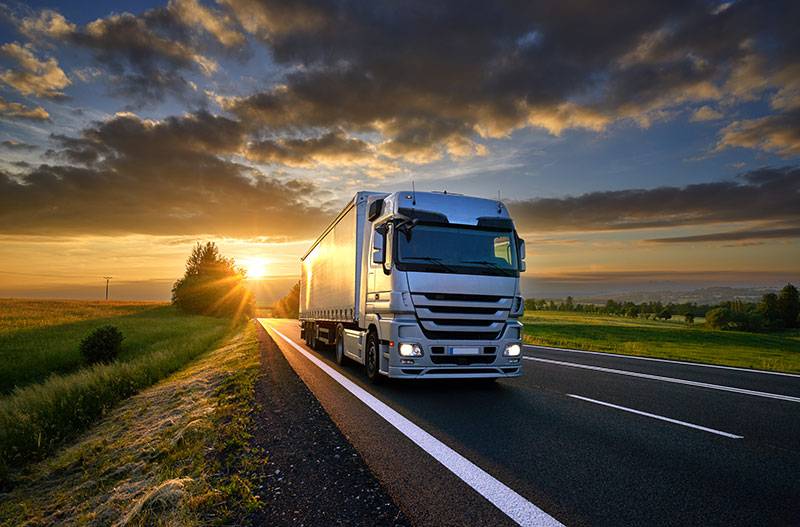 Dinex truck on the road.